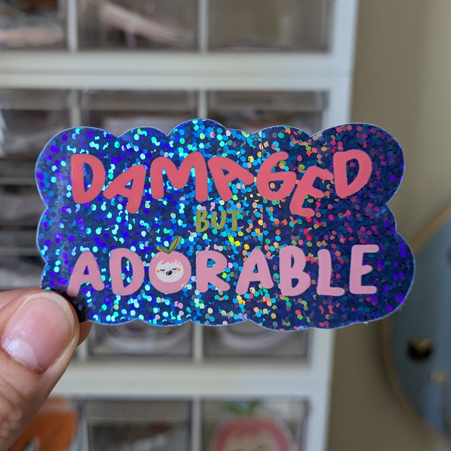 Damaged But Adorable Glitter Sticker 1