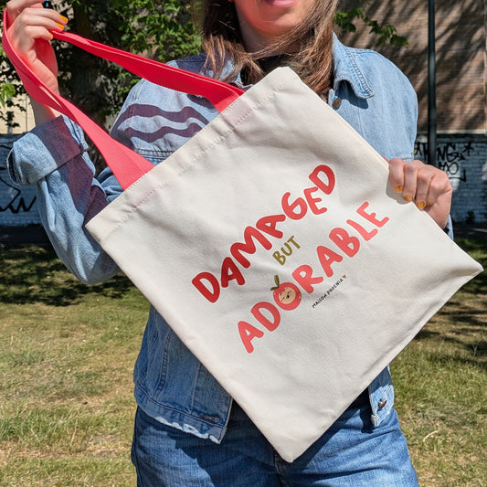 Damaged But Adorable Tote Bag 1