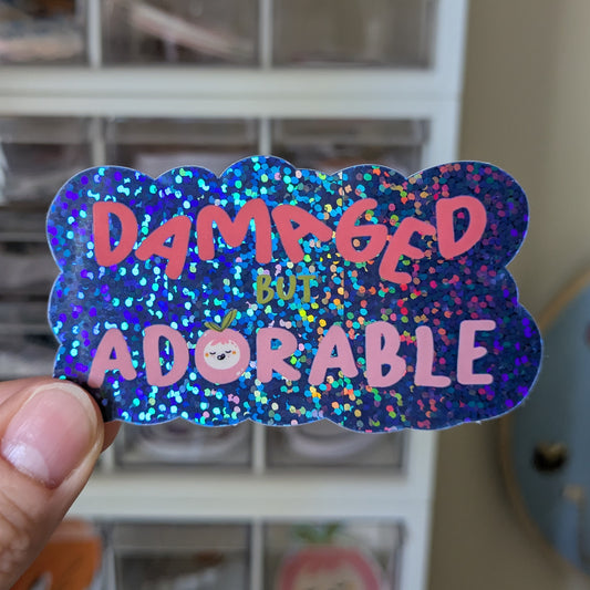 Damaged But Adorable Glitter Sticker 1