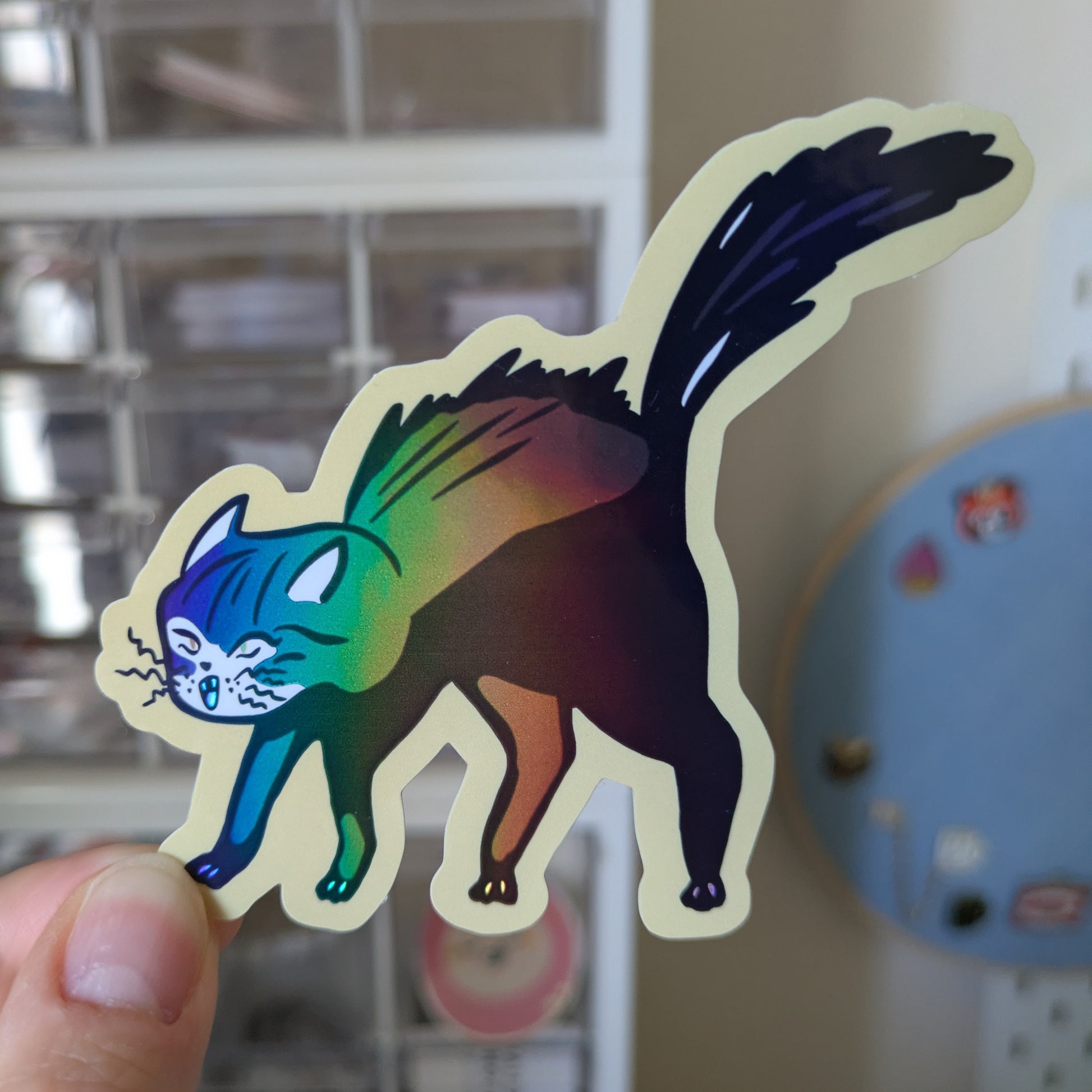 Holographic sticker of a spooky cat