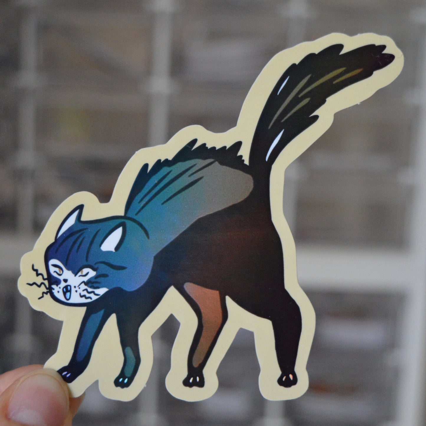 Sticker of a spooky cat