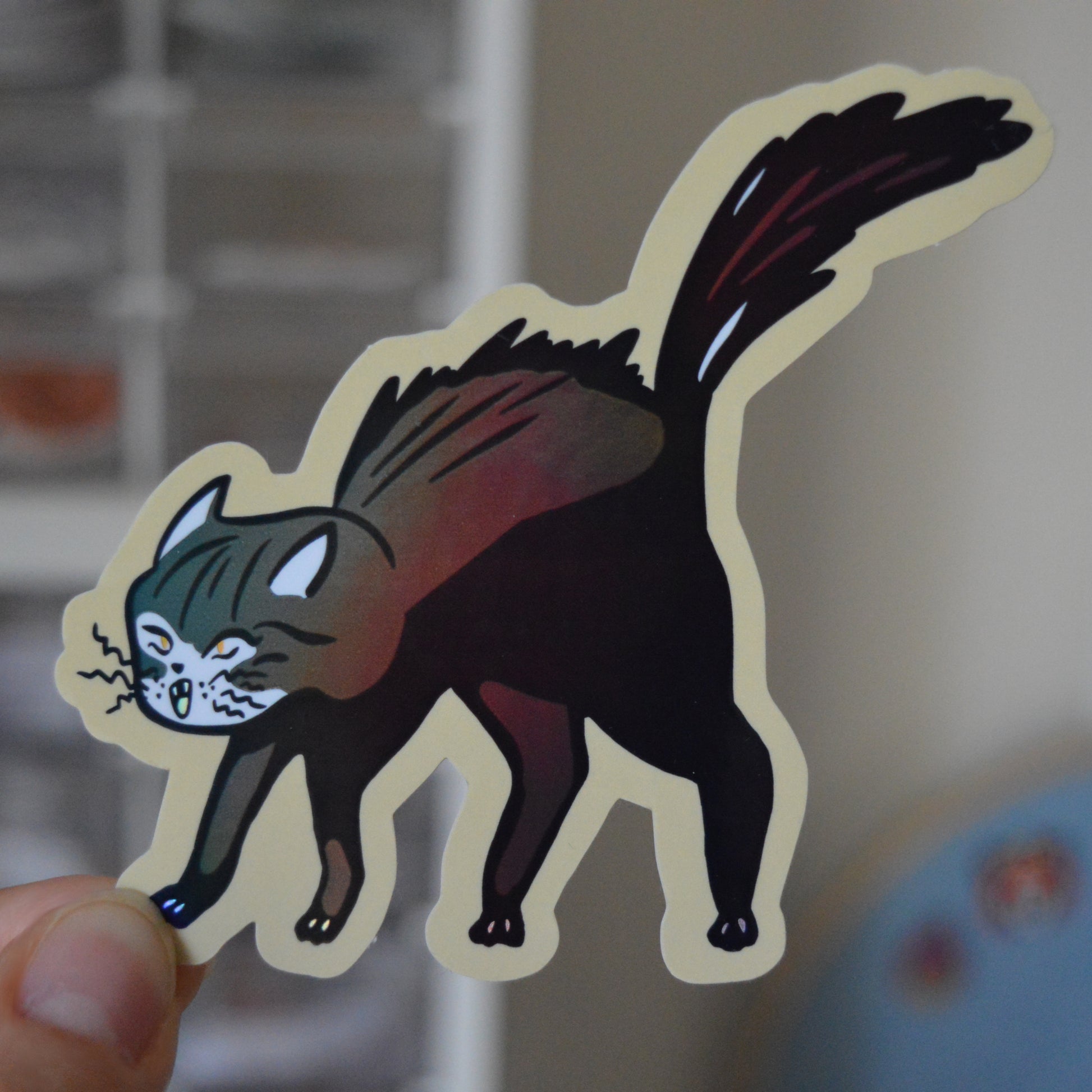 Sticker of a spooky cat